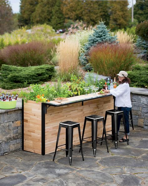 Gardener’s Supply Company is now offering a cedar outdoor cocktail bar that doubles as a planter. Made with solid and reclaimed cedar planks, the “Plant-A-Bar’s” bar unfolds for cocktail hour. Diy Garden Patio, Elevated Gardening, Bar Outdoor, Backyard Bar, Patio Planters, Tall Planters, Patio Plants, Patio Outdoor, Garden Bar