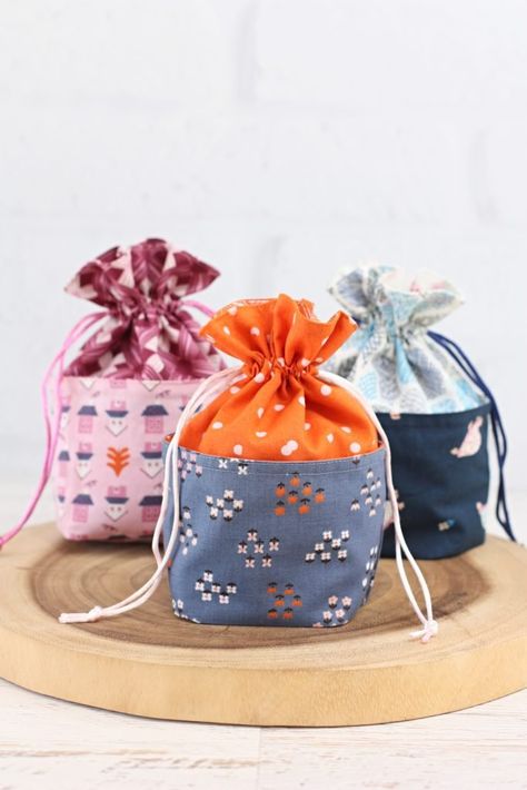 Mini Drawstring Gift Bag A Spoonful Of Sugar, Drawstring Gift Bag, Sweet Bags, Holiday Fabric, Pattern Store, Fabric Baskets, Gift Pouch, Fabric Gift Bags, Sewing Pattern Design