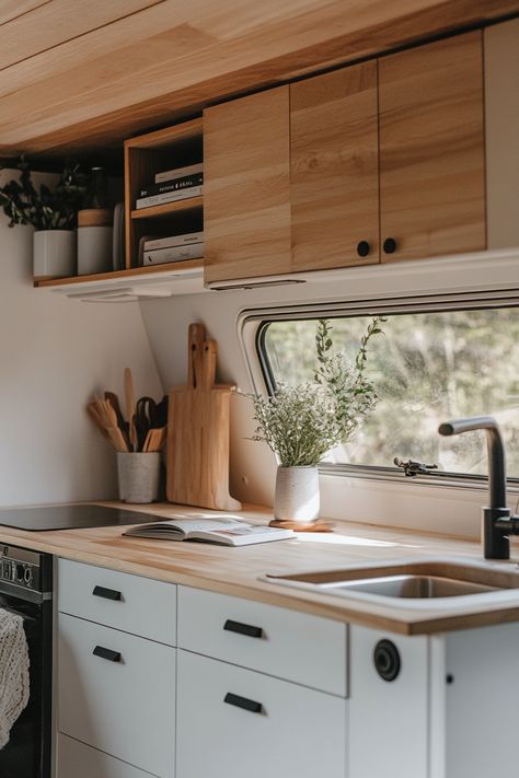 Remote Work Camper Interior. Sleek White cabinets with accents of plywood.

In today's hyper-connected world, the concept of a traditional office is increasingly becoming a relic of the past. Digital nomads are constantly on the hunt for the perfect balance between comfort and productivity, and the RV home office trend seems to be the current frontier.

Read more: https://tastyinteriors.com/generated-post-50-minimalist-rv-home-office-setups-mobile-workspaces-for-digital-nomads/ Minimalist Mobile Home, Modern Rv Interior, Moroccan Tile Floor, Yoga Platform, Tent Platform, Rv Home, Rv Homes, Boho Patio, Traditional Office