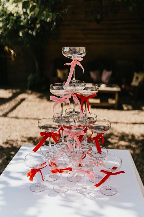 A Magical Day. So full of love and such good fun! Pink and red velvet ribbons with luscious pink peonies and red roses. The biggest thank you to F and C for letting me be part of your incredible, unforgettable day. . . Photography | @jessicahopwoodphotography Venue | @thestarinnatharome @thestarinnatharomeweddings Planning, Design and Styling |@styling.love and Francesca! Flowers | @queensflowersuk . . #weddingday #elegantwedding #elegantbride #yorkshirewedding #champagnetower #weddingpla... Valentines Wedding Flowers, Pink Red Burgundy Wedding, Valentines Wedding Decor, Pink And Red Groomsmen, Red And Pink Table Decor, Valentine Engagement Party, Red And Pink Dinner Party, Red And White Theme Party, Red Pink Wedding Flowers