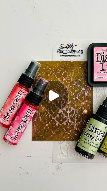 Ranger Ink (Official) on Instagram: "Get ready to elevate your crafting game with @Tim_Holtz Distress® Spritz! 🎨✨ Watch as @shabby.soul blends colors, adds layers with stencils, and creates this stunning background. Follow these simple steps to add a dazzling shimmer to your projects. 🌟🖌️   Products: 🔹Tim Holtz Distress® Spritz: Picked Raspberry, Worn Lipstick 🔹 Tim Holtz Distress® Spray Stain: Crushed Olive, Bundled Sage 🔹 Tim Holtz Distress® Ink Pad: Kitsch Flamingo 🔹 Tim Holtz Distress® Kraft Heavystock 🔹 Tim Holtz® by Stampers Anonymous Layering Stencil: Deco Floral 🔹 Tim Holtz Distress® Sprayer 🔹 Ranger Heat It™ Craft Tool 🔹 Tim Holtz® by Tonic Media Surface Mat   Directions: 1️⃣Mist Spray Stains onto Kraft Heavystock. Spray again with water. 2️⃣Dry with Heat It Tool. 3️⃣Pr Tim Holtz Bowtied Colorize, Tim Holtz Distress Spritz, Distress Spritz, Tim Holtz Tutorials, Ranger Distress Ink, Tim Holtz Distress Ink, Collage Techniques, Ranger Ink, Card Making Supplies