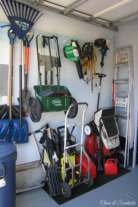 Awesome garage makeover! Lots of ideas to get your garage organized! // cleanandscentsible.com Organize Garage, Functional Garage, Pegboard Garage, Garage Organization Tips, Lawn Mower Storage, Garage Diy, Clean Garage, Garden Tool Organization, Shed Organization