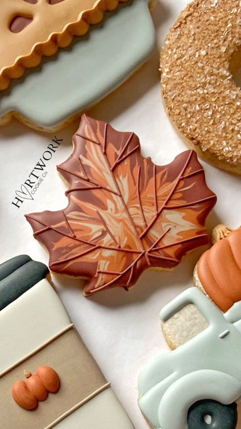 🎃What’s weird is that I really don’t like Halloween at all, but to date, this is probably my favorite set I ever made. The colors alone… | Instagram Thanksgiving Cookies Decorated, Fall Decorated Cookies, Maple Leaf Cookies, Halloween Cookies Decorated, Royal Iced Cookies, Leaf Cookies, Sugar Cookie Royal Icing, Iced Sugar Cookies, Happy Friday Friends