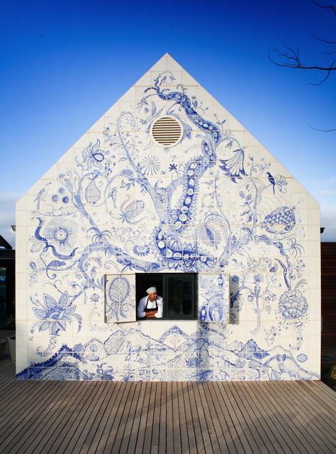 Chef Victor Phillips looks out of the window in the wall of the restaurant that features a blue-and-white tiled mural, the Bosjes Tree of Life, created by Lucie de Moyencourt and Michael Chandler. Design Del Prodotto, Mural Art, Architecture Details, Design Inspo, Exterior Design, Interior Architecture, Interior And Exterior, Wall Murals, Architecture Design