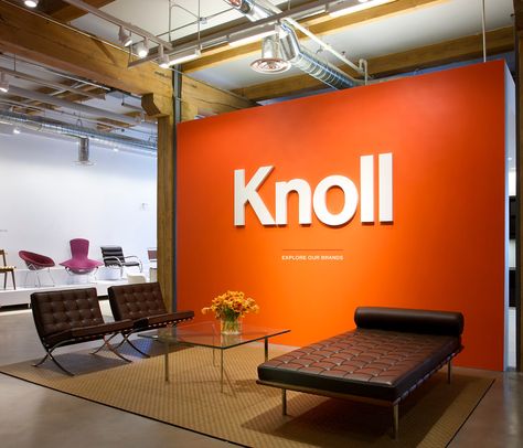 Modern Office Entrance Design, Orange Wall Office, Logo Wall Design Office Branding, Orange Branding Design, Orange Office Design, Office Entrance Design, Knoll Office, Orange Office, Knoll Furniture