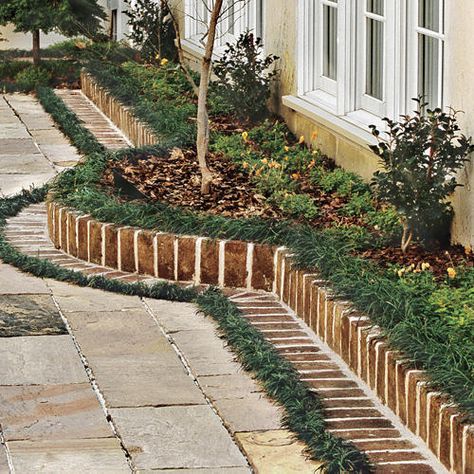 Try this simple technique that looks great year-round. Brick Landscape Edging, Brick Flower Bed, Brick Border, Brick Garden Edging, Flower Bed Borders, Flower Bed Edging, Landscape Borders, Flower Bed Designs, Brick Garden