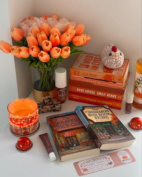 🎃🕯️ Mid October orange book stack 🕯️🎃 QOTD: what kind of books do you like to read during spooky season? ( stars hallow bookmark from @fleursonsunday ) . . . . . . #book #booklover #reader #romancebooks #romancereader #books #tbr #bookshelf #bookstack #bookaesthetic #beautifulbooks #bookshelfdecor #fantasybooks #fantasyreader Cozy Fall Book Aesthetic, Autumn Book Photography, Cozy Reader Bedroom, Colorful Fall Aesthetic, Fall Cozy Books, Cozy Fall Reading Aesthetic, Fall Decorations Aesthetic, Books And Candles Aesthetic, Autumn Books Aesthetic