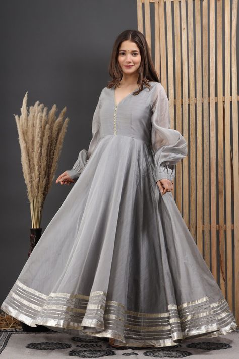 Discover exquisite Pakistani suits for every occasion! From party wear to casual elegance, explore a stunning collection of Pakistani dresses perfect for weddings, parties, and everyday chic. Elevate your wardrobe with intricate designs and luxurious fabrics. Find your ideal dress outfit among our curated selection of suits and outfits. Don't miss out on the latest trends in Pakistani fashion! #PakistaniSuits #DressesCasual #SuitDesign #Fashion #Outfits #PakistaniOutfits Gota Work Dress, Grey Gown, Long Frock Designs, Stylish Maxi Dress, Performance Outfits, Gota Work, Pakistani Fancy Dresses, Womens Prom Dresses, Simple Pakistani Dresses