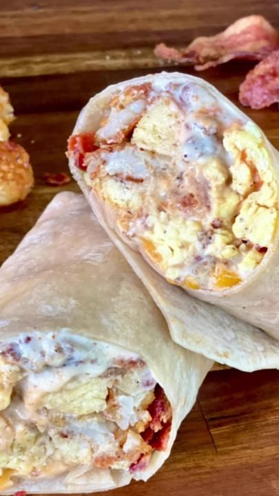 The BEST Biscuits and Gravy Loaded Burrito on the @webergrills new 28i... | TikTok Breakfast Burrito With Gravy, Biscuits And Gravy Breakfast Burrito, Loaded Biscuits And Gravy, Biscuits And Gravy Burrito, Loaded Burrito, Egg Burrito, Best Biscuits And Gravy, Best Biscuits, Sausage Gravy And Biscuits