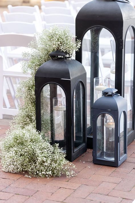 Large black lanterns, floating candles, baby's breath garlands - ceremony aisle entry Black Lantern Wedding, Lanterns Floating, Wedding Ceremony Aisle, Ceremony Decorations Outdoor, Balloon Lanterns, Wedding Church Decor, Black And White Wedding Theme, Wedding Isles, Ceremony Aisle