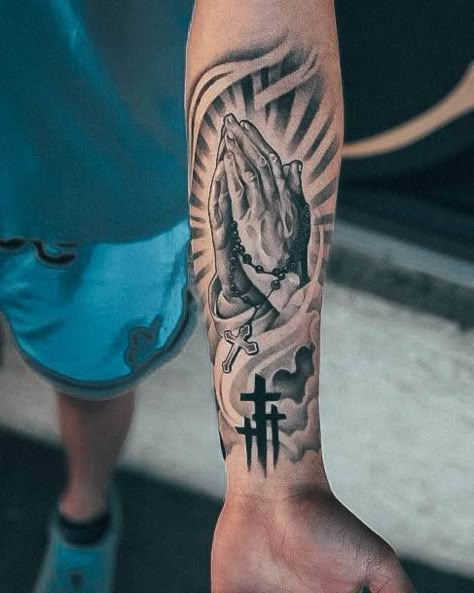 If you have been looking for unusual tattoo designs with praying hands for a long time, then our article is for you. We have collected 55+ of the most interesting and their meanings in human life. Prayer Hands Tattoo, Praying Hands Tattoo Design, Religion Tattoos, Memorial Tattoo Ideas, Leg Sleeve Tattoos, Forearm Tattoo Quotes, Full Hand Tattoo, Praying Hands Tattoo, Simple Forearm Tattoos