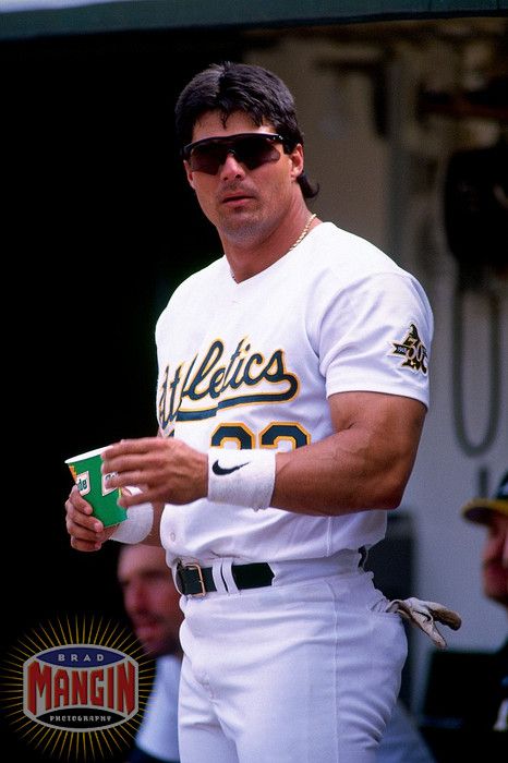 Jose Canseco in his return to the Oakland A's in 1997. The reunion would be short-lived. Photo by Brad Mangin. Bash Brothers, Orel Hershiser, Hot Rugby Players, Baseball Legends, Oakland Coliseum, Jose Canseco, Oakland A’s, Batting Cages, Baseball Guys