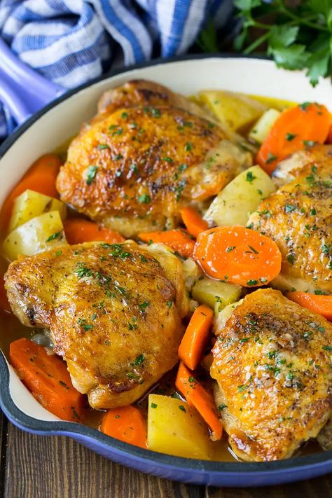 Braised chicken thighs with carrots and potatoes in a skillet. Chicken Carrots, Chicken Breast Crockpot Recipes, Braised Chicken Thighs, Chicken Shawarma Recipe, Crockpot Chicken Breast, Roasted Chicken And Potatoes, Potatoes And Carrots, Potato Dinner, Roasted Chicken Thighs