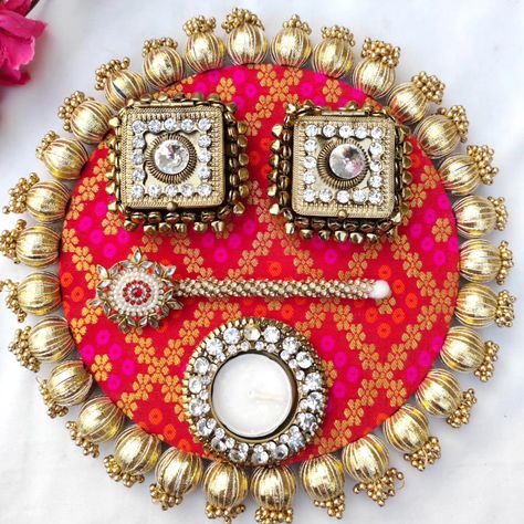 Puja thali with boxes nd Diya nd tilak stick DM us for more details or WhatsApp us on 9866422790 Unique Aarti Thali Decoration Ideas, Tilak Stick, Aarti Thali Decoration Ideas, Aarti Thali, Puja Thali, Diwali Diya Decoration, Thali Decoration, Diya Decoration, Thali Decoration Ideas