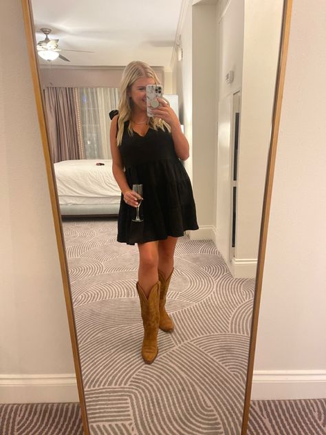 Brown Country Boots Outfits, Black Dress Brown Cowboy Boots, Black Outfit With Cowboy Boots, Mini Dress With Cowboy Boots, Black Dress And Cowgirl Boots, Dress With Brown Cowboy Boots, Black Dress Cowboy Boots, Brown And Black Cowboy Boots Outfit, Black Dress With Boots Country