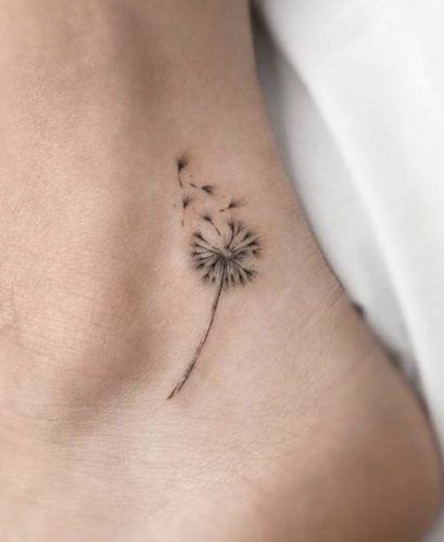 Discover 22 Unique Dandelion Tattoo Inspirations for 2024 – Embrace Nature's Beauty on Your Skin Dandelion Tattoo With White Ink, Small Dandelion Tattoo, Cute Thigh Tattoos Women, Dandelion Tattoo Meaning, Dandelion Tattoos, Dandelion Tattoo Design, Cute Thigh Tattoos, Ankle Tattoos For Women, Dandelion Tattoo