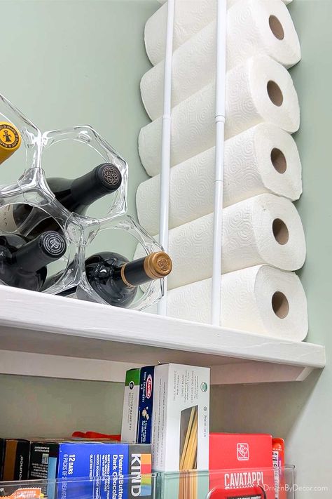 Paper towels stored vertically with use of tension rods Storing Paper Towels, Paper Towel Storage, Kitchen Cabinet Organization Ideas, Wicker Bar Stools, Utility Closet, Home Organization Ideas, Driven By Decor, Tension Rods, Pan Organization