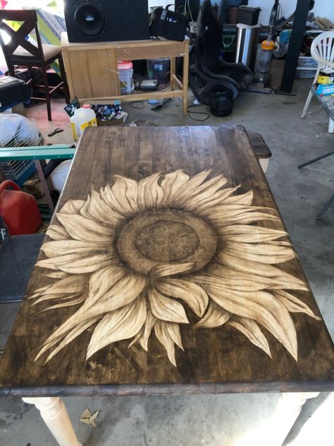 My best friend asked me to recreate Misty Gaines-Johnson’s sunflower table for her going away gift. This was my go at it! It was very tedious work but so gratifying in the end. 🌻🤎 Wood Staining Techniques, Picnic Table Makeover, Sunflower Table, Wood Burning Techniques, Wood Burn Designs, Stained Table, Painting Creative, Flower Table, Wood Burning Crafts