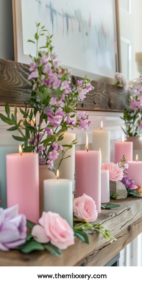 Artificial pink candles and roses on a wooden mantelpiece with a framed abstract painting above. Baby Shower Mantle Decor, Spring Mantle Decorating Ideas, Spring Fireplace Mantle Decor, Fireplace Mantle Decor Ideas, Spring Fireplace, Spring Fireplace Decor, Mantel Flowers, Spring Mantel Decor, Easter Mantle Decor