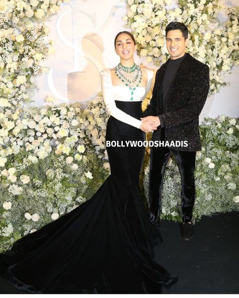 Kiara Advani and Sidharth Malhotra made their 'permanent booking' on February 7, 2023. First, the couple got married in a grand wedding ceremony at Suyragarh Palace, in the presence of their close family and friends. The couple is now set for their grand wedding reception in Mumbai. They have invited prominent names of Bollywood for the celebration of their love. However, the couple and their look of the night left our jaws dropped.    Sidharth Malhotra and Kiara Advani's Mumbai receptio Kiara Reception Look, Kiara Advani Outfits Wedding, Kiara Advani Reception Look, Sidharth Malhotra And Kiara Advani Wedding, Kiara Advani Wedding Outfits, Kiara Advani Reception, Reception Look For Groom, Kiara Advani And Sidharth Malhotra, Reception Poses