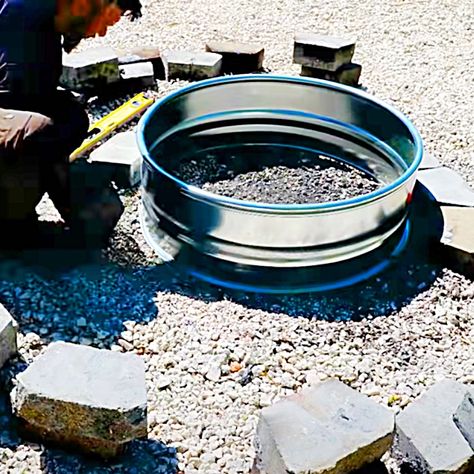 DIY Smokeless Fire Pit Build - DIY Outdoor Ideas - How To Build A Fire Pit Stock Tank Fire Pit, Build Fire Pit, Metal Fire Pit Ideas, Fire Pit Smokeless, Burn Pit Ideas Backyards, Diy Smokeless Fire Pit Plans, Rim Fire Pit Ideas, Homemade Tabletop Fire Pit, Diy Fire Pit Ideas Cheap Simple