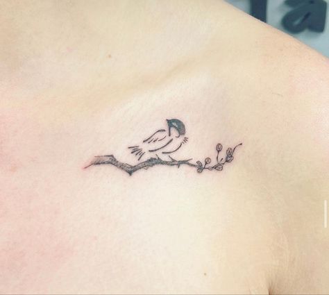 Fine line, delicate tattoo of a small bird landed on a branch with buds Bird With Branch Tattoo, Small Robin Tattoo, Bird On A Branch Tattoos For Women, 3 Birds On A Branch Tattoo, Bird On Branch Tattoo, Small Bird On Branch Tattoo, Birds On A Branch Tattoo, Two Birds On A Branch Tattoo, Bird Branch Tattoo