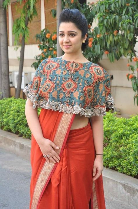 Charmy Kaur In Orange Saree With Crop Top Blouse Plain Saree With Designer Blouse, Saree With Designer Blouse, Charmy Kaur, Saree Draping Styles, Orange Saree, Sari Blouse Designs, Plain Saree, Blouse Designs Indian, Saree Blouse Patterns