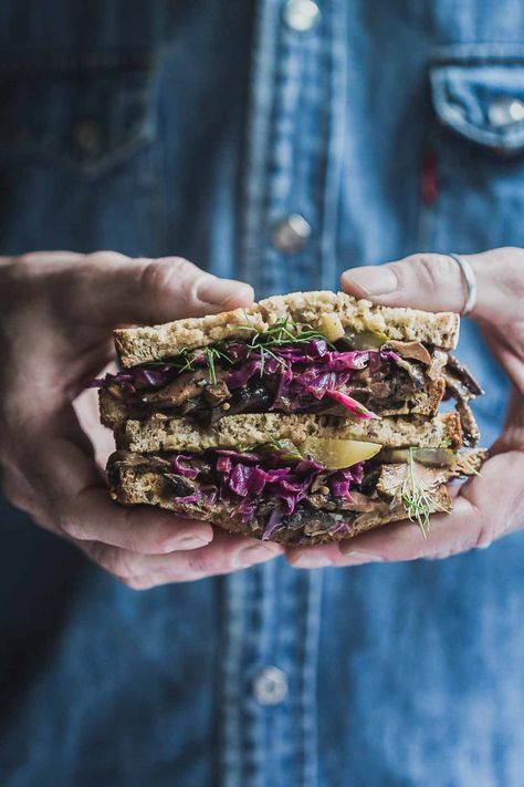 I get food crushes all the time; I am a bit of a tart that way. However, I think this Vegan Mushroom Reuben Sandwich might be the real thing. Pan fried spiced mushrooms, homemade red cabbage Vegan Reuben Sandwich, Vegan Reuben, Red Cabbage Sauerkraut, Mushroom Vegan, Russian Dressing, Reuben Sandwich, Vegan Mushroom, Vegan Mozzarella, Vegan Burgers