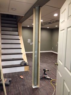 Before I start talking about the support pole, I want to mention a little project I did that I am super thrilled with. I knew I wanted to pu... #basementideas Basement Pole Covers, Bright Basement, Basement Poles, Basement Decoration, Unfinished Basement Ideas, Basement Bathroom Ideas, Basement Remodel Ideas, Basement Organization, Dream Basement