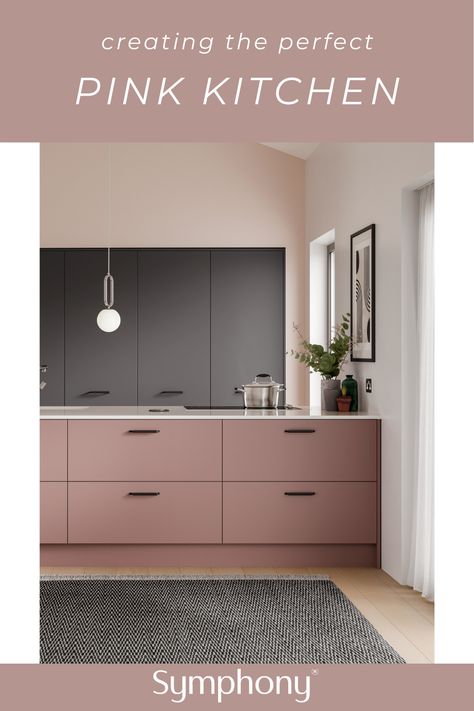 If you’re looking for something truly unique in the kitchen, think pink! Pink kitchens are the perfect way of livening up your kitchen and this Dusky Pink shade is set to be one of the hottest trends this year. Make a bold statement with this new style – it will instantly make your kitchen feel fun and creative.  Read more about creating the perfect kitchen in our new blog post today!  #symphonygroup #symphonykitchens #pinkkitchens #newkitchen #modernkitchen #altakitchens Soft Pink Kitchen Cabinets, Pink Kitchen Modern, Dusky Pink Kitchen Cabinets, Pink Kitchen Set, Rose Gold Kitchen Cabinets, Dusty Pink Kitchen Cabinets, Rose Kitchen Cabinets, Grey And Pink Kitchen Ideas, Dusky Pink Kitchen