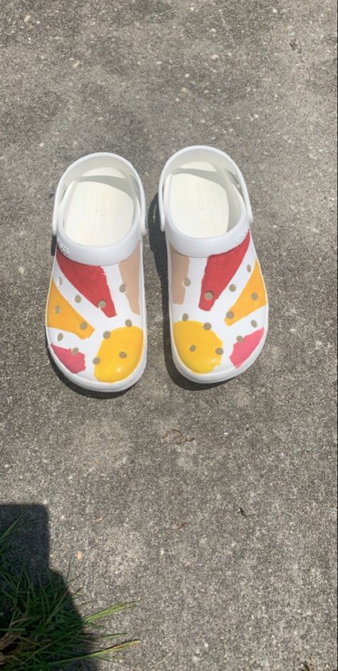 Sunshine painted Crocs Painted Crocs Shoes Diy, Crocs Customize Paint, Painting On Crocs, Diy Crocs Shoes Paint, Custom Painted Crocs, Painted Crocs Ideas, Painting Crocs Shoes Diy, Drawing On Crocs, Custom Crocs Shoes Paint