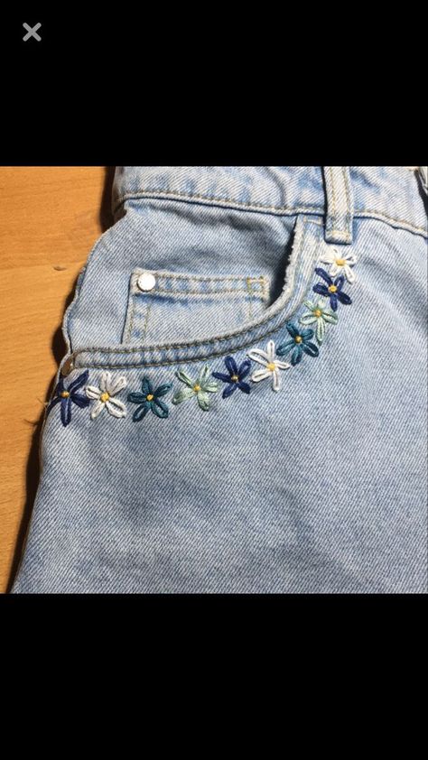 Jean Shorts Embroidery Diy, Embroidery Stitches On Jeans, Embroidery On Jean Pockets, Pant Leg Embroidery, Jeans Hand Embroidery, Embroidered Flowers On Jeans, Embroidery Jean Pocket, Embroidery Flowers On Jeans, Hand Embroidery On Jeans