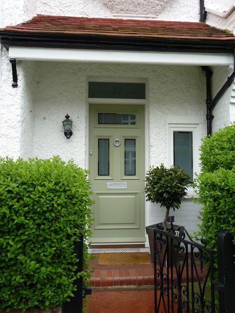 Olive green front door with chrome door furniture. Olive Green Doors Exterior, Olive Green Front Door, Front Door Victorian, Front Of House Makeover, White Storm Door, Front Door Apartment, Front Door Green, Green Front Door, Green Doors