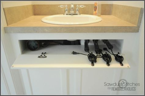 Take back that dead cabinet space by turning the front piece into a tilt-out storage spot. Bathroom Storage Cabinet Under Sink, Shabby Chic Bathroom Vanity, Natural Bathroom Cleaner, Hair Tool Storage, Baños Shabby Chic, Natural Bathroom, Handy Man, Tool Storage Diy, Under Sink Organization