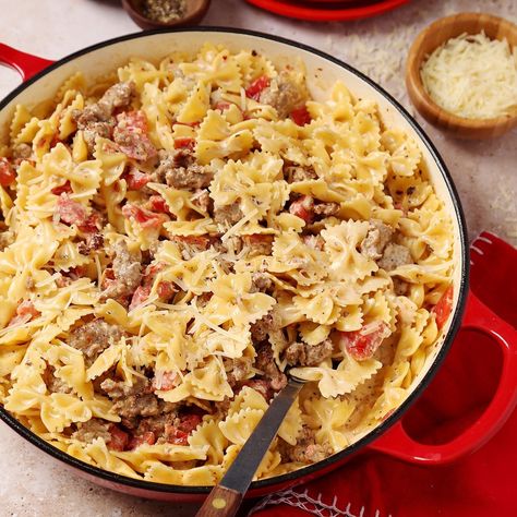 This easy sausage bow tie pasta recipe is fantastic for busy weeknights. Whip it together with simple but tasty ingredients, and it will feed the whole family in just a few simple steps. Sausage Bow Tie Pasta, Pasta With Tomato Cream Sauce, Tomato Cream Sauce Pasta, What's For Supper, Bow Tie Pasta Recipe, Easy Dinner Recipes For Family, Sausage Parmesan, Bow Tie Pasta, Italian Sausage Recipes