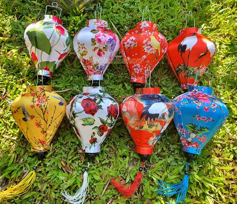 PRICES MAY VARY. ✅ This item is for 8 pcs lanterns 22 cm, Garlic shape, with 8 colors like the photos ✅These Vietnam silk lanterns are the perfect way to decorate Weddings, Restaurant decorations, hotels, yards, gardens, or event decorations. They're also the best gift for a Wedding Party, Banquet Event, Ceremony, Tet Holiday, Lunar New Year, or Tet Holiday. ✅Customize: If you want to choose another shape, another color. Please send me a message about your choice. Example: Shape A: color 12, 14. Lanterns With Flowers, Ornament Shapes, Silk Lanterns, Purple Lantern, Lantern Decor Wedding, Bamboo Lantern, Lantern Candle Decor, Flowers Fabric, Bamboo Frame