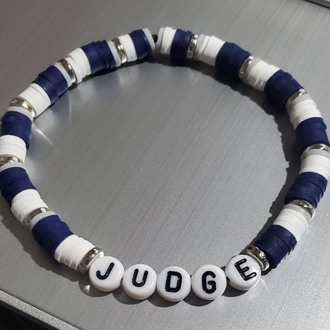 This Is A Judge Beaded Bracelet In The Yankee Colors Blue & White And Silver Spacers. A Fun Bracelet To Wear Alone Or Stacking With Other Bracelets. These Bracelets Are Made With A Sturdy Elastic Cord Available In Multiple Sizes. Unisex Bracelets Size Guide: 5” - Kids 6” - Small 7” - Average Adult 8” - Large Thank You For Visiting My Store. Boys Bracelets, White Beads Bracelet, Blue Beaded Bracelets, Fun Bracelet, Baby Bracelet, White Bracelets, Unisex Bracelets, Mens Beaded Bracelets, Beaded Bracelets Diy