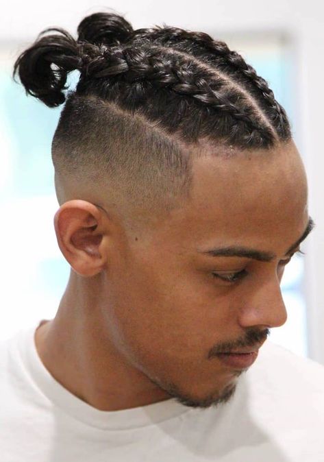 This is an example of a double row ponytail braid that starts front to back directing diagonaly opposite from each other with a pony tail finish on both. This hairstyle is also accompanied by a high fade with a skin fade finish. Braids With Fade, Braided Man Bun, Long Braided Hairstyles, Hairstyles Reference, Casual Braids, Hairstyle Braided, Two Braid Hairstyles, Twin Braids, Tan Skin Blonde Hair