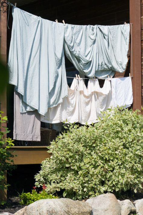 Porch Clothes Line, Linen Sheets, Line Drying, Homesteading, Log Cabin Old Fashioned Clothes, Log Cabin Porch, Natural Stain Remover, Cabin Porch, Doing Laundry, Linen Sheets, The Porch, Laundry Rooms, Clothes Line