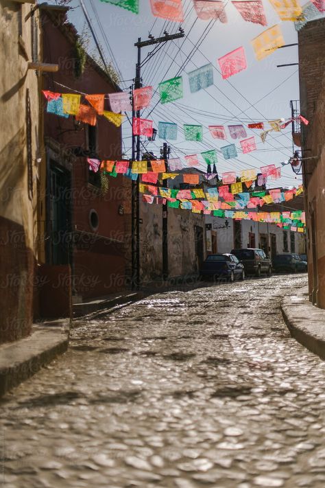 Stock Photo of Colorful Decorative Mexican Flags in Streets of San Miguel de Allende, Mexico Travel Photography Inspiration Wanderlust Adventure  with beautiful people and landscapes USA #exploretheworld #travelphotography #usatravelphotography #travelaesthetic #worldtravelphotography #newenglandtravelphotography #wanderlust #wanderlustphotography #wanderlustphotos #travellandscapephotography #stocksy #stocksyunited #sanmigueldeallende #mexicotravel Mexican Flags Decor, Mexico Street Photography, Mexican Culture Photography, Mexico Film Photography, Mexico Street Aesthetic, Photography Mexico, Old Mexico, Mexican Street Market, Mexican Flag Aesthetic