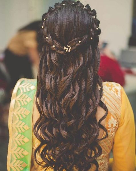 Hairstyle inspiration for indian brides | Crown braids with curly hairs embellished with pearls | half up half down hair styles | Sangeet and mehendi hairstyle ideas | Pretty curls | Indian bridal fashion | Credits: Orange The Salon | Every Indian bride’s Fav. Wedding E-magazine to read. Here for any marriage advice you need | www.wittyvows.com shares things no one tells brides, covers real weddings, ideas, inspirations, design trends and the right vendors, candid photographers etc. Reception Hairstyles, Hairstyles For Indian Wedding, Engagement Hairstyles, Indian Wedding Hairstyles, Bollywood Hairstyles, Open Hairstyles, Indian Bridal Hairstyles, Short Wedding Hair, Bridal Hairstyles