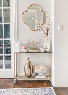 Glam Vignette Entryway table with gold vase via @shannongolddesign White And Gold Console Table Decor, Pink White And Gold Home Decor, Hallway Vase Decor, Glass Foyer Table, Gold And White Console Table, Home Gold Decor, White And Gold Bedroom Aesthetic Modern, Console Table Decorating Gold, Entryway White Table Decor