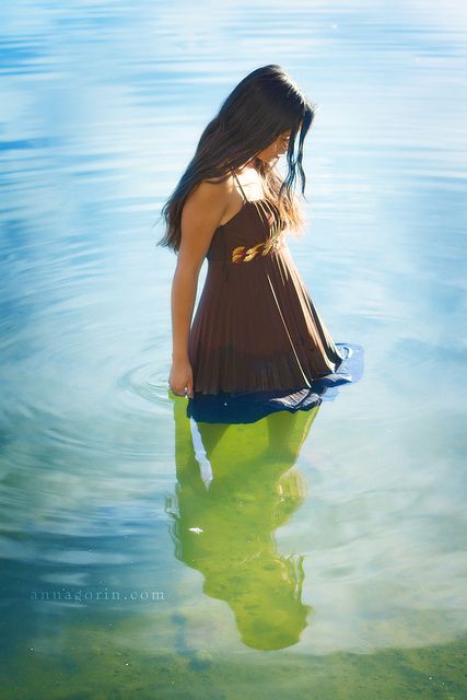 Standing in the stillness Person Standing Looking Down, Standing In Water Drawing, Sitting In Water Reference, Beach Photo Reference, Floaty Pose Reference, Standing Still Pose Reference, Standing In Water Reference, Person In Water Reference, Person Standing In Water