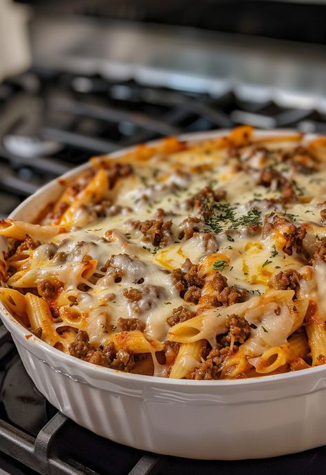 Learn How to Cook Baked Ziti With Ground Beef And Ricotta Recipe For Free | Recipes You'll Love, Made Easy! Quick Baked Ziti, Ziti With Ground Beef, Baked Ziti With Ground Beef, Baked Ziti With Ricotta, Pasta Toppings, Most Popular Recipes On Pinterest, Ricotta Recipe, Trendy Recipes, Ricotta Recipes