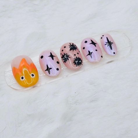 On a roll with the anime nails. Checkout my Etsy store https://blingitonnails.etsy.com #calcifer#howlsmovingcastle #anime #animeart #animenails #cosplay #nails #smallbusiness #nailsdesign #nailartist #womenowned #Etsy #popupshop #oc #gelnails #nailart #fashion #beauty #BlingItOnNails Howls Moving Castle Nail Art, Calcifer Nails, Cosplay Nails, Howls Moving Castle Nails, Castle Christmas, Nail Aesthetic, Anime Nails, Nails For Kids, Howls Moving Castle