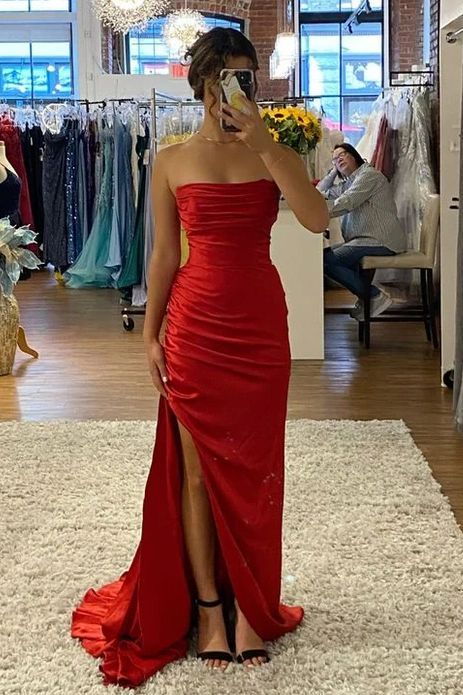 Dazzle at your next party with our Red Strapless Empire Party Prom Dress With Slit. The gorgeous empire waist and strapless design will accentuate your figure, while the stunning red color exudes confidence. With a seductive slit, this dress is perfect for dancing the night away.