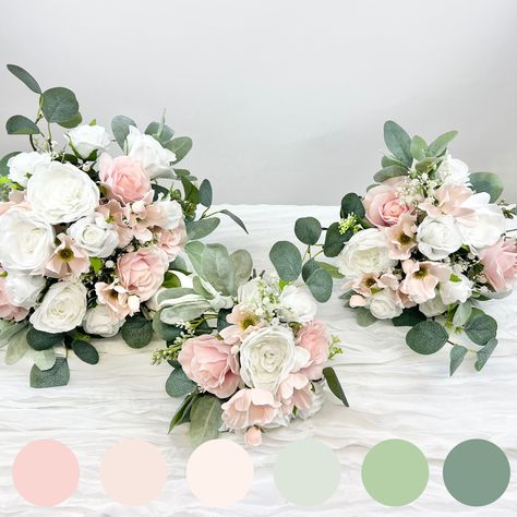 "Blush Pink and White Bridal Bouquet Collection 💕Each bouquet has blush pink cosmos and roses with realistic rose leaves - plus white babies breath and garden roses 💕Premium wedding quality artificial flowers and faux greenery including lambs ear and eucalyptus 💕3 bouquet sizes to choose from: small 9x12\", medium12x14\", large15x15\" 💕Perfect size for bride, bridesmaids & flower girls 💕Elegant blush pink and white faux florals 💕10 different satin ribbon options. Just make a note in the order personalization instructions during checkout to select your ribbon color" Bridal Bouquet Blush Pink And White, Blush Pink And Sage Green Bridal Bouquet, Blush And Sage Bridal Bouquet, Pink Green Flower Arrangements, Bridal Bouquet Eucalyptus Blush Pink, Blush Pink And Eucalyptus Wedding, Blush Pink And White Wedding Flowers Bridesmaid Bouquets, Dusty Pink And Sage Green Wedding Bouquet, Blush Pink And Sage Green Bridesmaid Bouquet