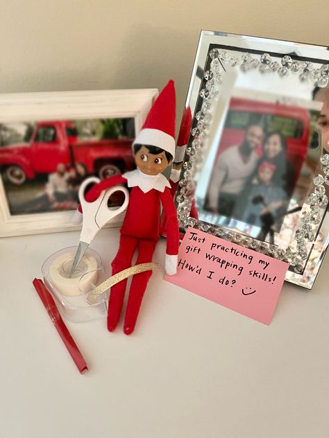 elf on the shelf, elf on the shelf wrapping gifts, tiny wrapping paper, tiny scissors #elfontheshelfideas #elfontheshelf #elfontheshelfideasforkids Elf On The Shelf With Wrapping Paper, Elf On The Shelf Wrapping Paper, Shelf Elf, Wrapping Gifts, On The Shelf, Elf On The Shelf, Wrapping Paper, Elf, Gift Wrapping