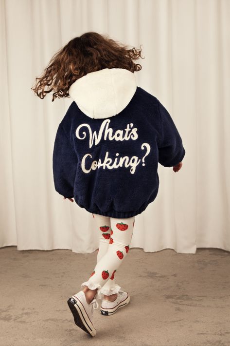 Kids oversized faux fur jacket in blue with an embroidered Ritzratz patch in the front and a large "What’s Cooking?" chenille embroidery in the back. Autumn Winter 2023, Anthony Bourdain, Live Now, Julia Child, Mini Rodini, 2023 Collection, Salvador Dali, Oversized Jacket, Winter 2023