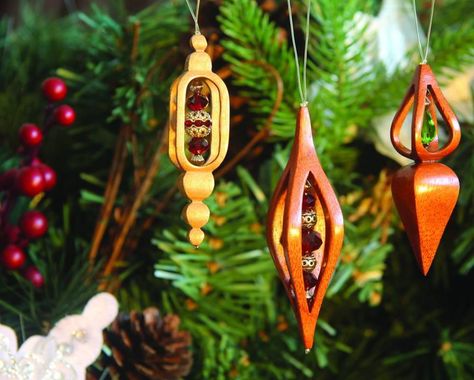 Make an intricate christmas ornament | Canadian Woodworking Canadian Woodworking, Simple Wood Carving, Scroll Saw Patterns Free, Beading Cord, Harvest Table, Wood Carving Patterns, Wood Christmas Ornaments, Wooden Projects, Scroll Saw Patterns